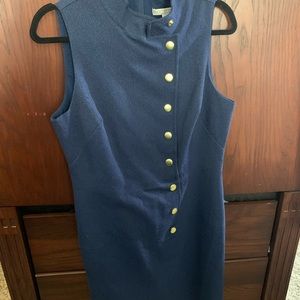 Navy blue dress with gold snaps from neck to bottom of dress.